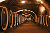 old-cellar-with-wooden-barrels-under-castle-making-2023-11-27-05-02-08-utc.jpg