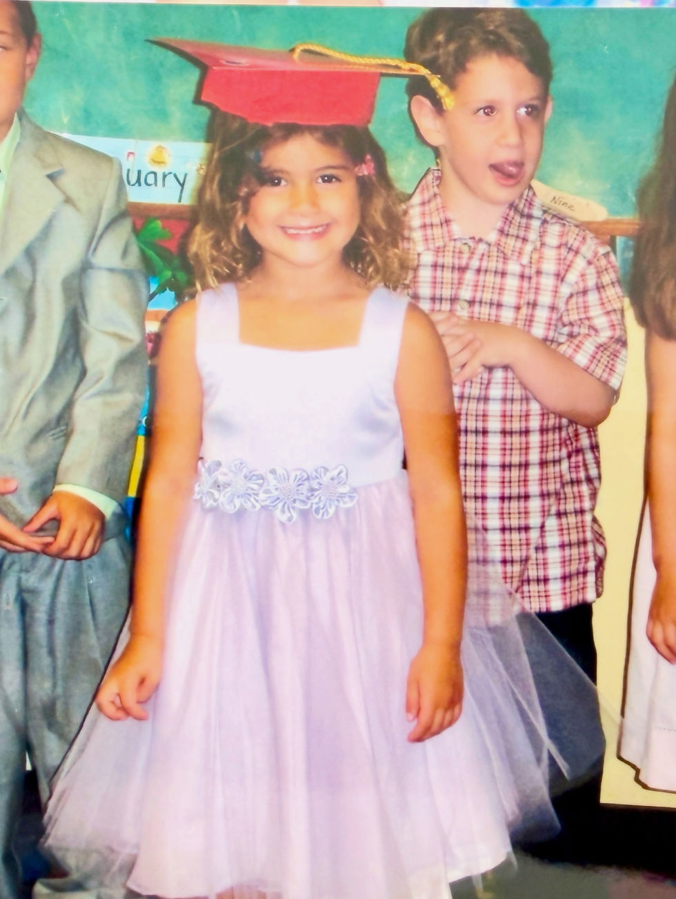 Bella graduating from Preschool