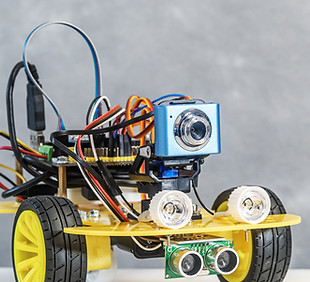 Programmable DIY Robotic two-wheeled vehicle with Obstacle Sensor and Camera with Wireless