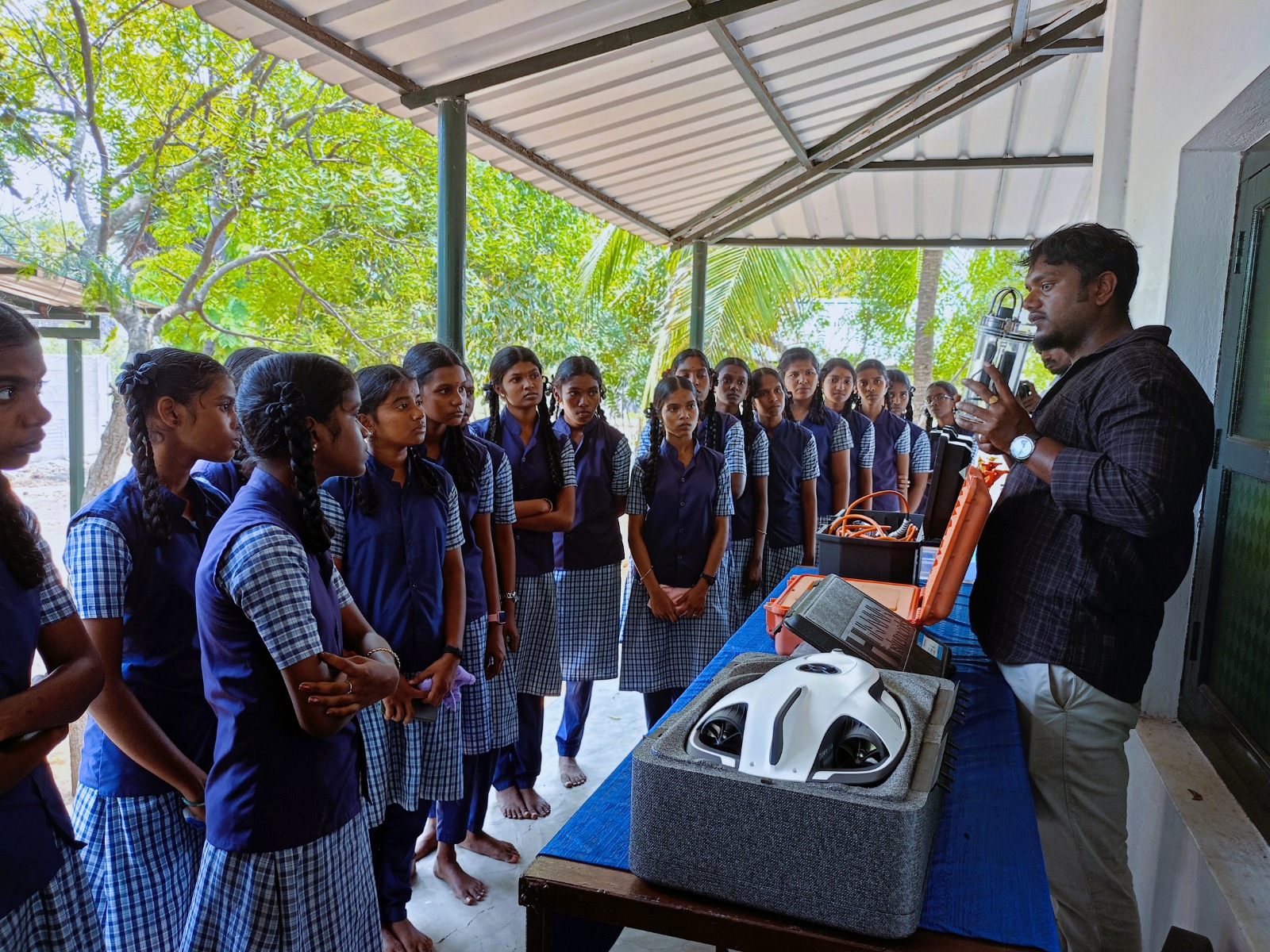 School students learning about marine equipment during a visit to the OMCAR Palk Bay Centre.