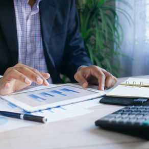 man tapping on tablet agenda on the desk bookkeeping