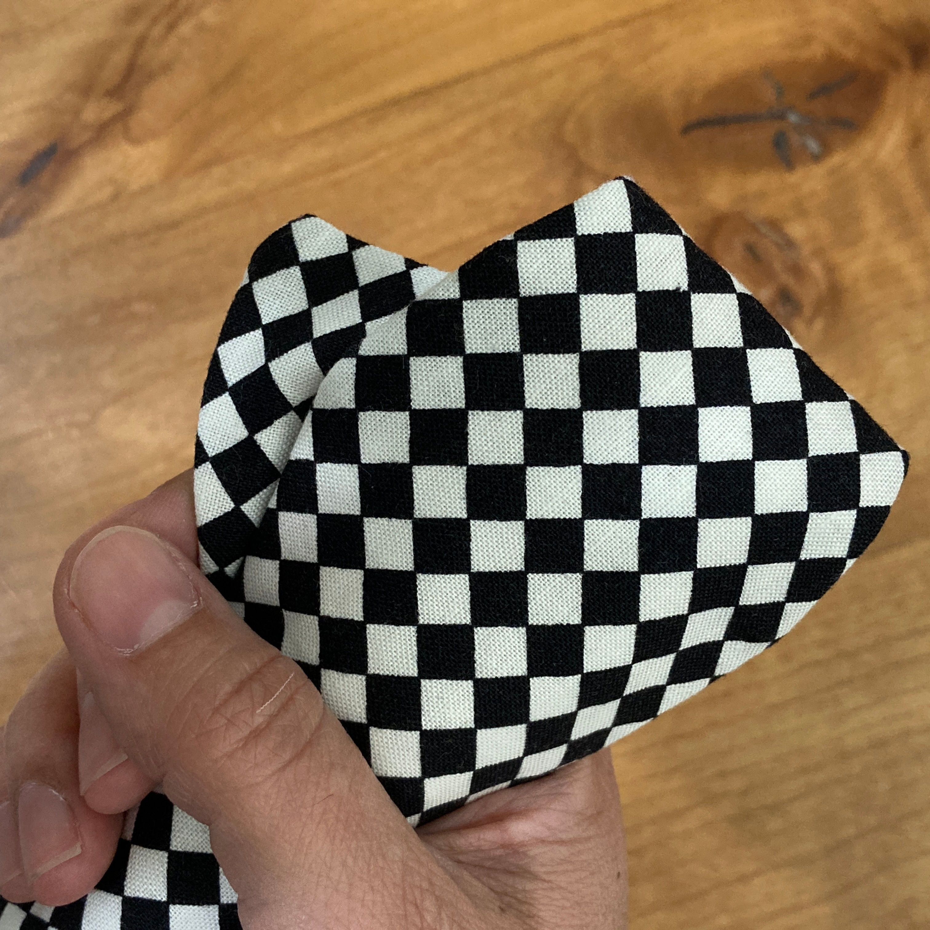 close up view of checkered classic bow tie