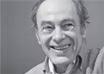 Black and white photo of Eugene Gendlin PhD, close up of a middle aged man smiling. He is at an international body oriented conference.