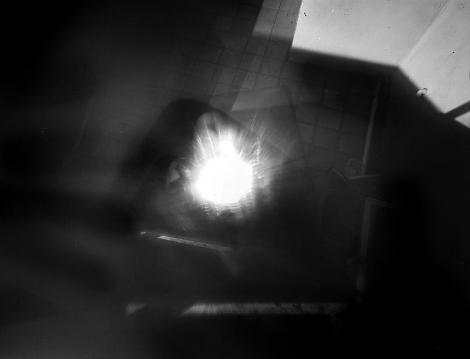 Pinhole photograph with hand print