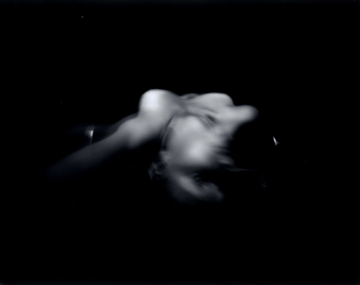 photo of a body with a dark background 