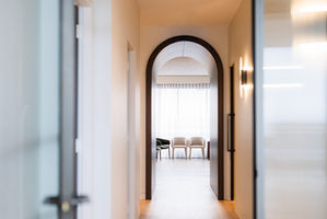 Feature timber lined arch to hallway, looking through to medical reception area.