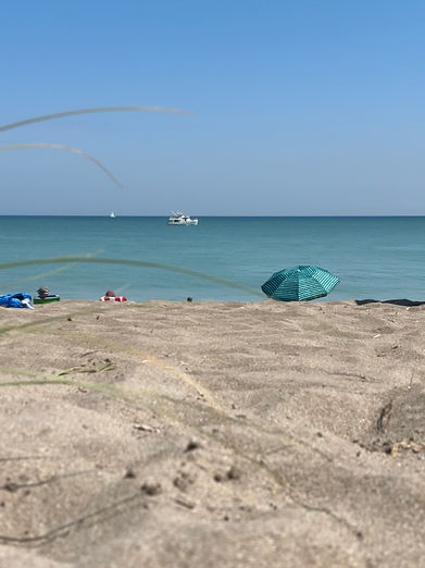 Cation states "Every Day Alterations" with blue sky and a view of the Atlantic Ocean From Hutchinson Island Florida