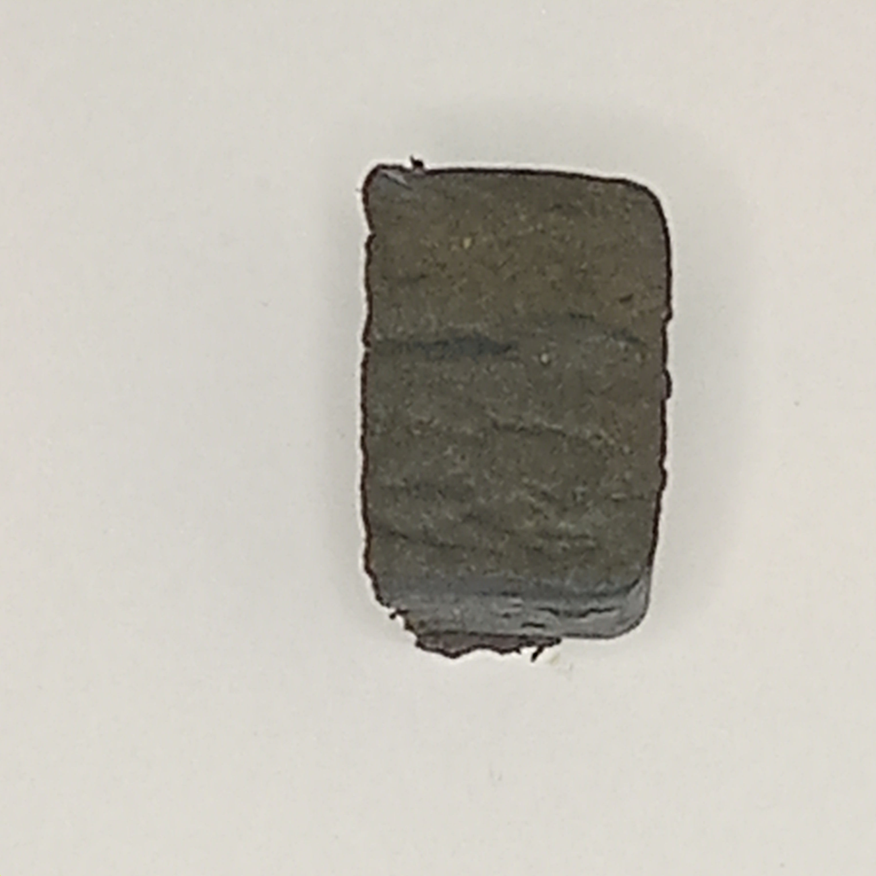 Watermelon hash pressed cannabis concentrate block with dark resin texture – High On A Hill Six Nations Ontario