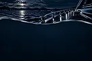nächtliche_yacht_über_dunkler_meereswelle.webp