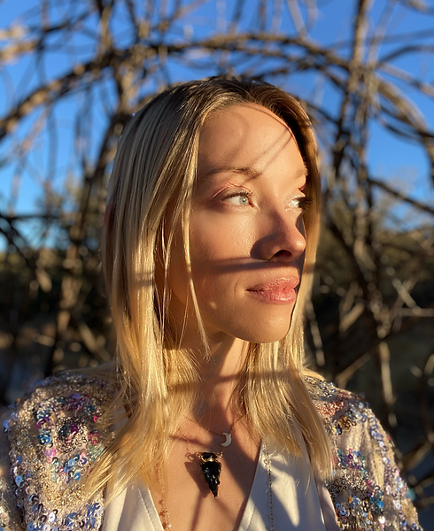 Megan Lee Joy providing transformational coaching to help clients find clarity and purpose.