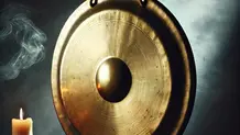 A candle, mystical smoke and a gong ready for an enlightening sound healing experience