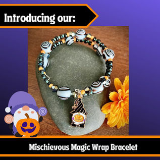 Beautiful beaded black and white bracelet with cute gnome charm!