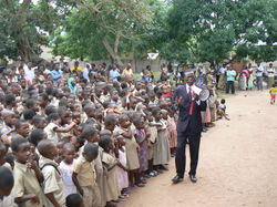 Handing out school supplies