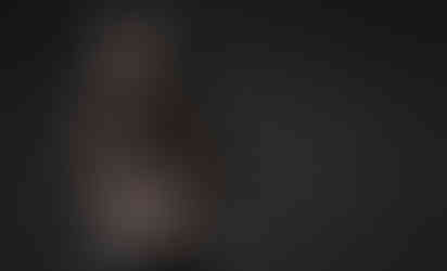beautiful maternity photoshoot in black background