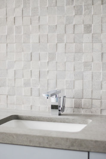white tile backsplash in a bathroom 