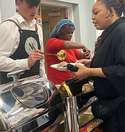 Professional buffet catering service by Noba Kitchen, serving freshly prepared Afro-Caribb