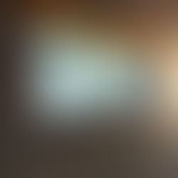 A wooden horse in a deep window sill with clay plaster.