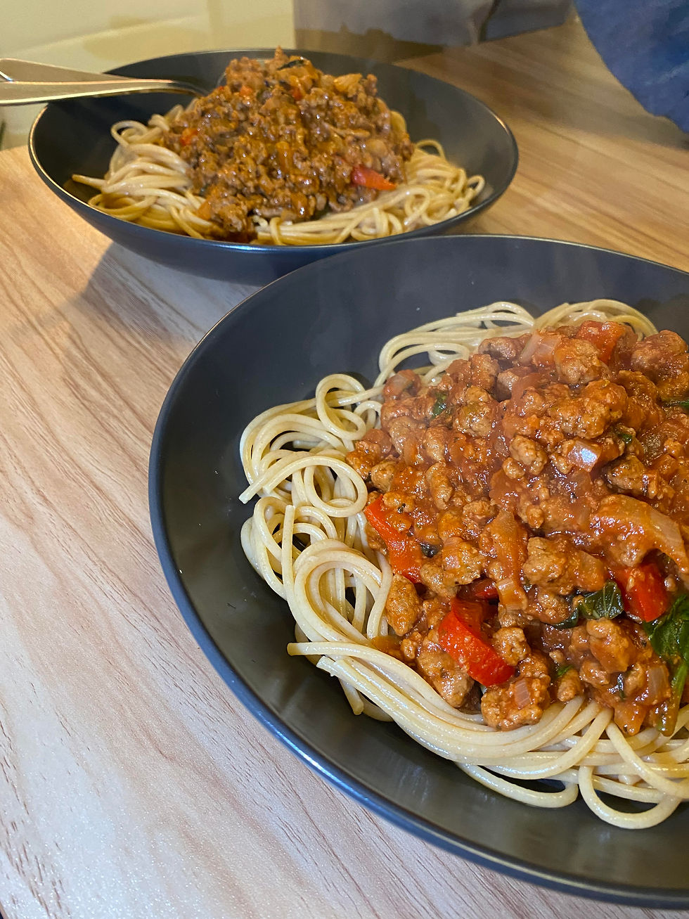 Two bowls of spaghetti bolognese