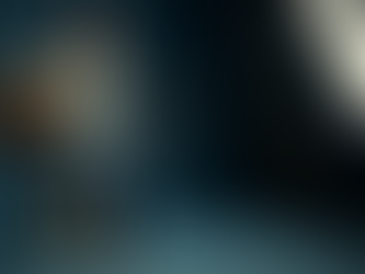 Chris Moore sentado com a guitarra durante foto promocional