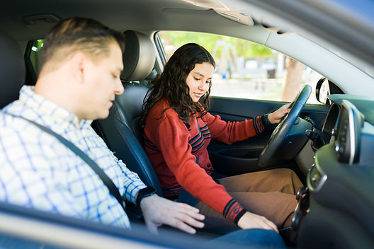 shutterstock dad and daughter in car.jpg