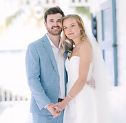 Couple Holdings hands smiling