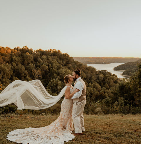 Tennessee Destination Weddings Venue on Center Hill Lake Near Gatlinburg and Nashville with Mountain and Lake views. Lodging for wedding guests accommodations in fall glamping, luxury event venue
