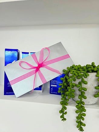 A silver envelope with pink ribbon bow