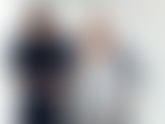 A physical therapist helps a Parkinson's patient.