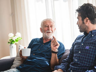 An adult son has a heart to heart conversation with his father. 
