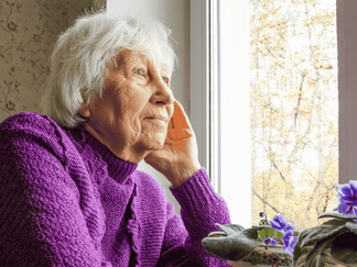 A sad elderly women.