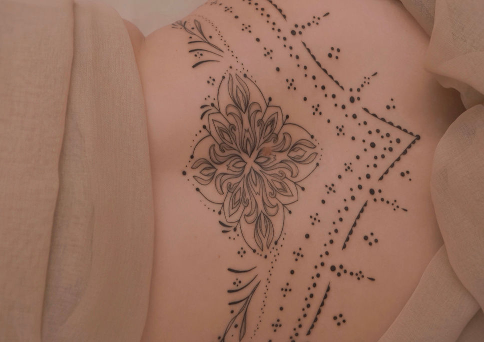 elegant hip ornamental tattoo for women in Germany