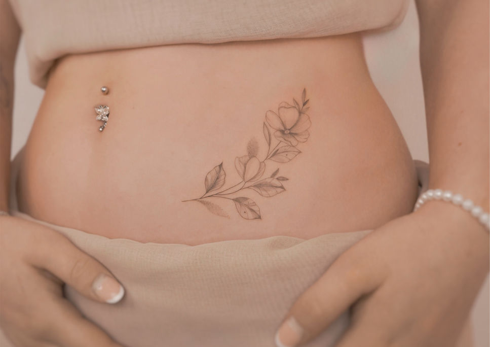delicate floral tattoo for her