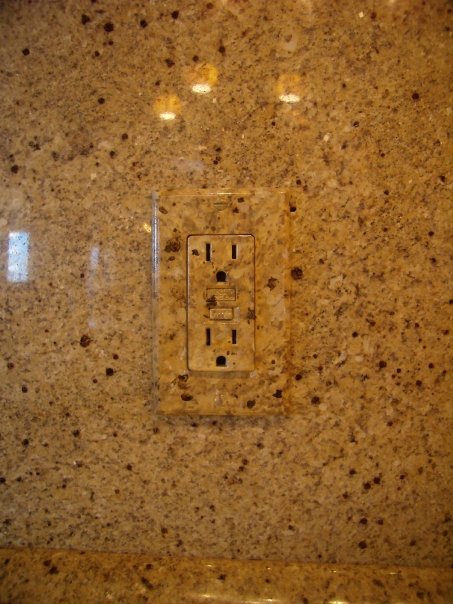 KItchen Hand painted switch place to match granite back splash