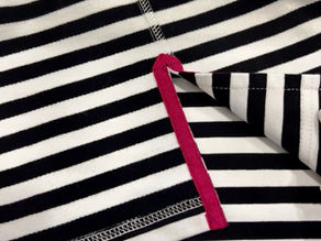 Обробка розрізу кіперною стрічкою на трикотажі