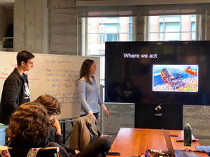Students present their projects to the judges during our demo day