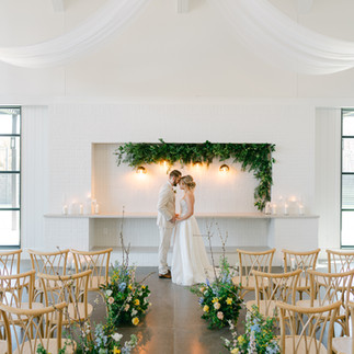 couple standing in the front for their ceremony