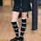 Thumbnail: KNIT BOW BACK SOCKS IN BLACK AND WHITE