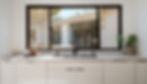 Modern kitchen cabinet showroom Chicago display with sink