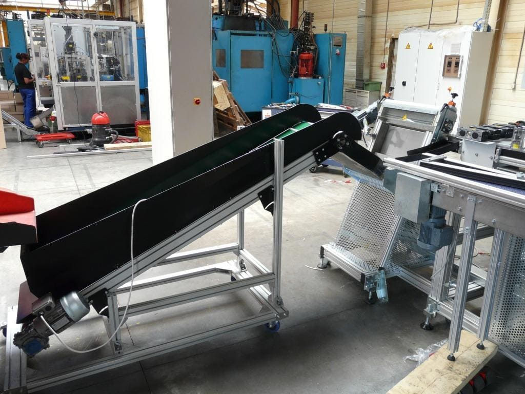 belt conveyor with cleats logistics solutions for the automotive industry