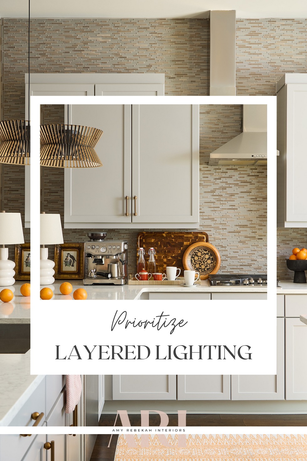 Stylish kitchen with white cabinets, mosaic backsplash, wood accents, oranges, and modern lighting. Text: Prioritize Layered Lighting.
