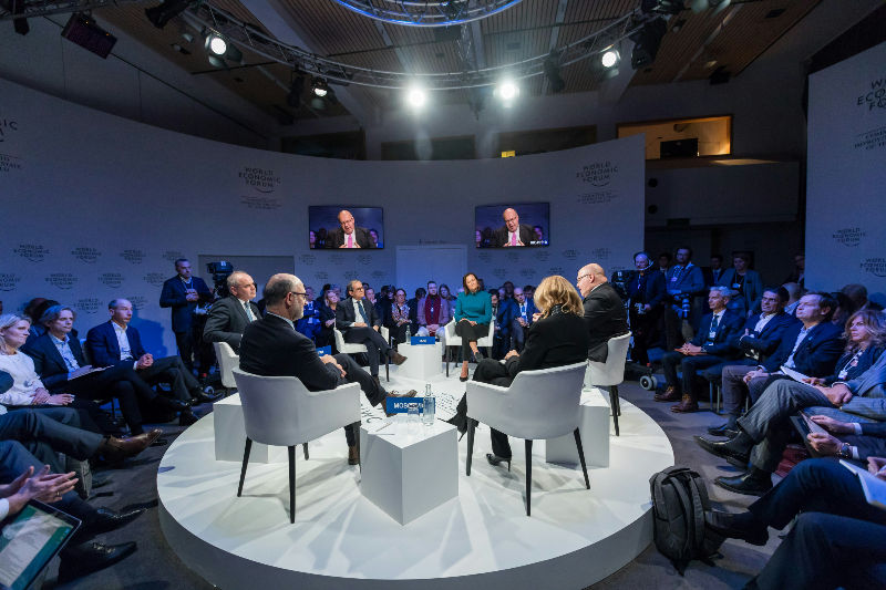 Thumbnail: Four marketers on a round white stage debating on event photographer rates