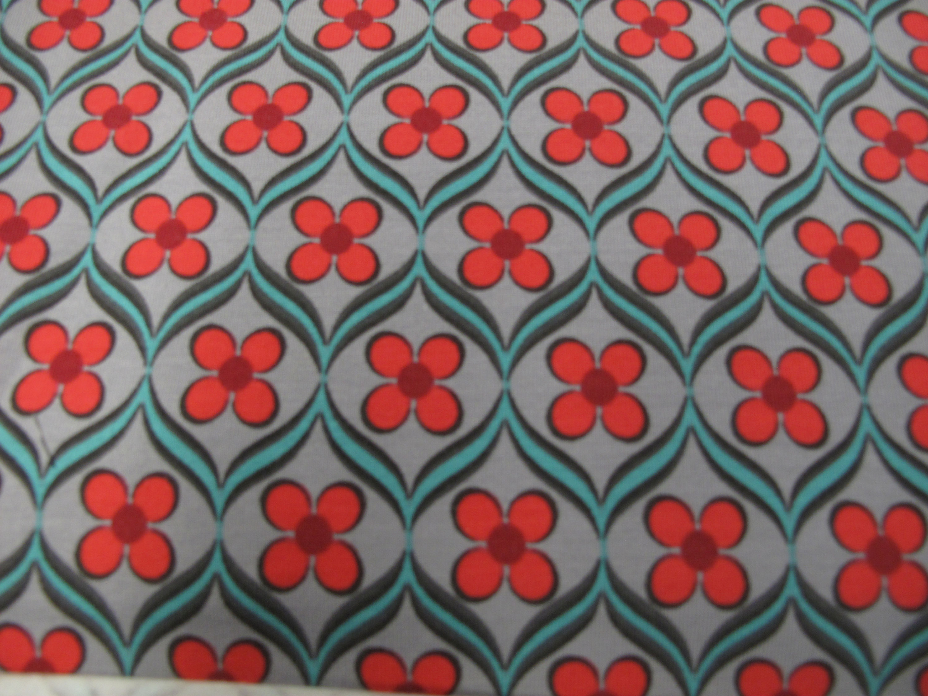 Tricot: katoen - elastine : grijs met rode bloemen