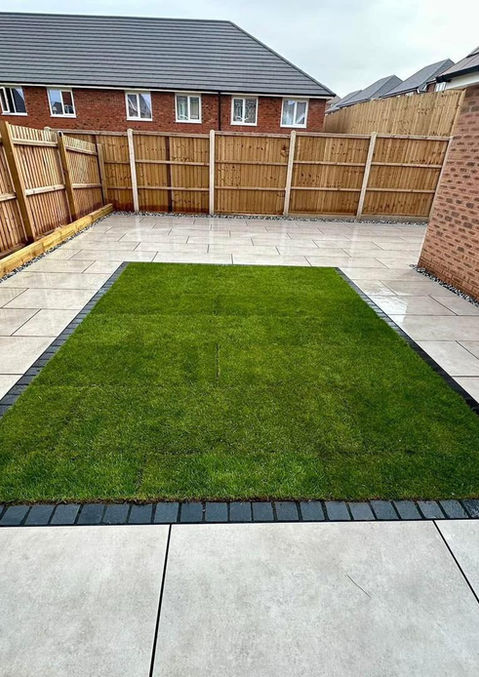 Porcelain patio with clean lines and professional landscaping