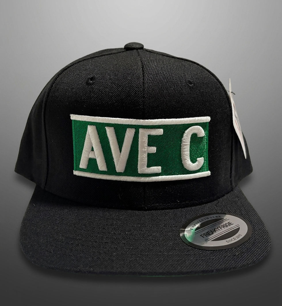 Black Ave C snapback hat with green street sign patch