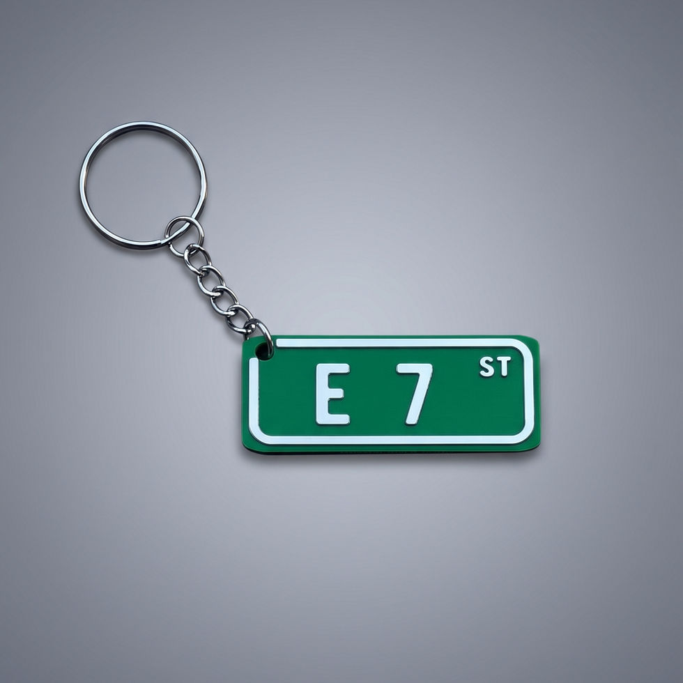 Green E 7 St street sign key chain