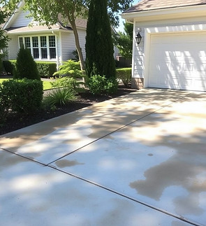 battery acid stains on concrete driveway.jpg
