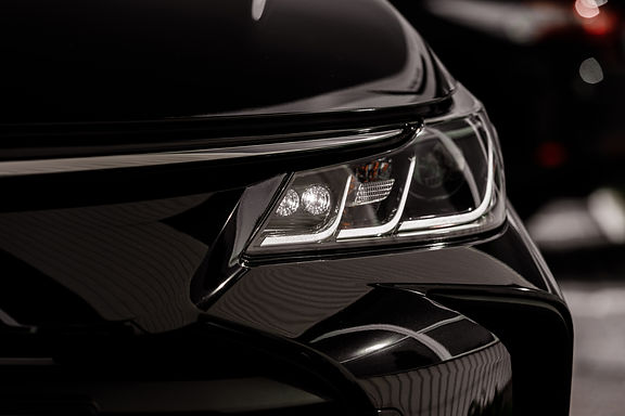 headlight-of-modern-prestigious-black-car-close-up-2026-03-10-01-58-20-utc.jpg
