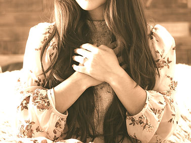 woman in white and red floral long sleev