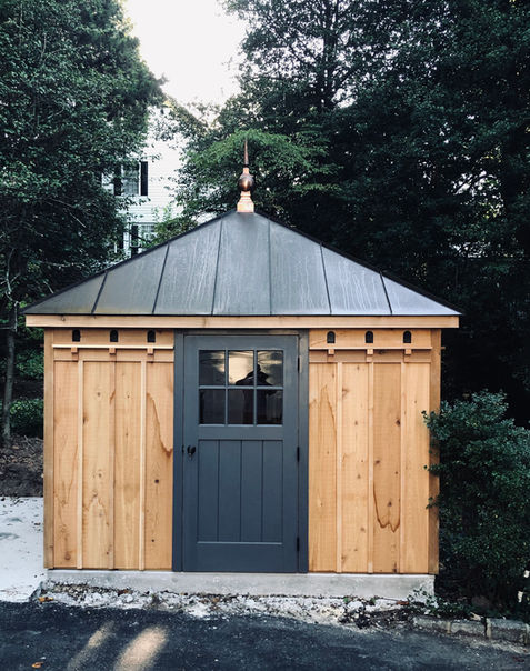 Custom-designed prefab garden house in the backyard, ideal for garden enthusiasts and outdoor living, with a unique and aesthetically pleasing architectural style