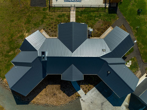 Aerial view of a completed residential roofing installation